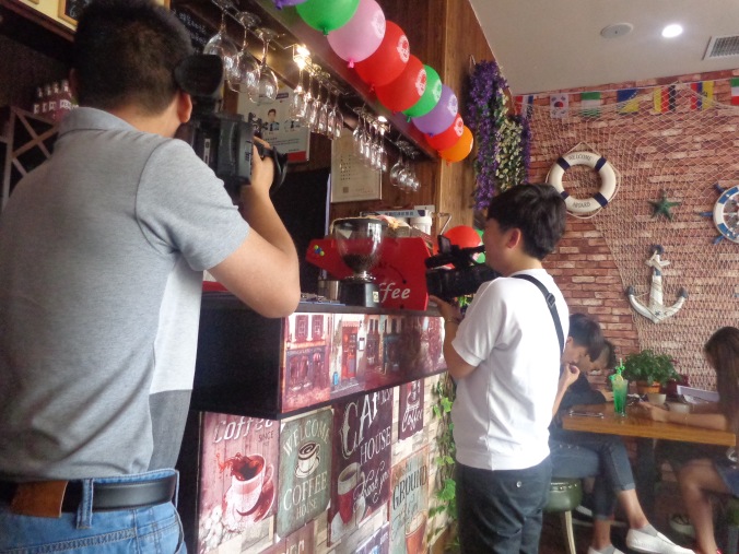 1 cameraman chinese coffee shop