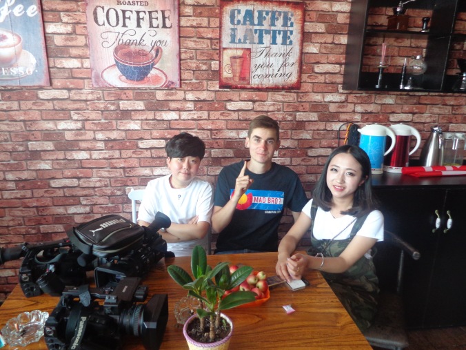 3 people coffee shop peace corps china matt christensen