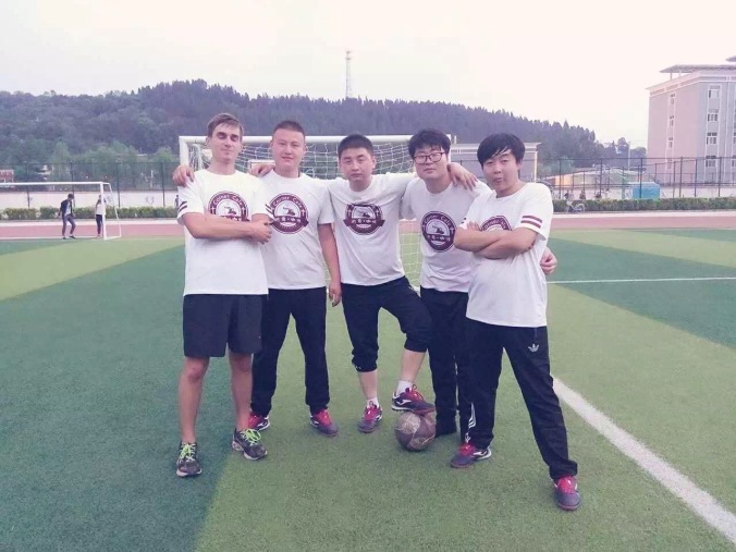 5 soccer teammates posing at practice peace corps china matt christensen