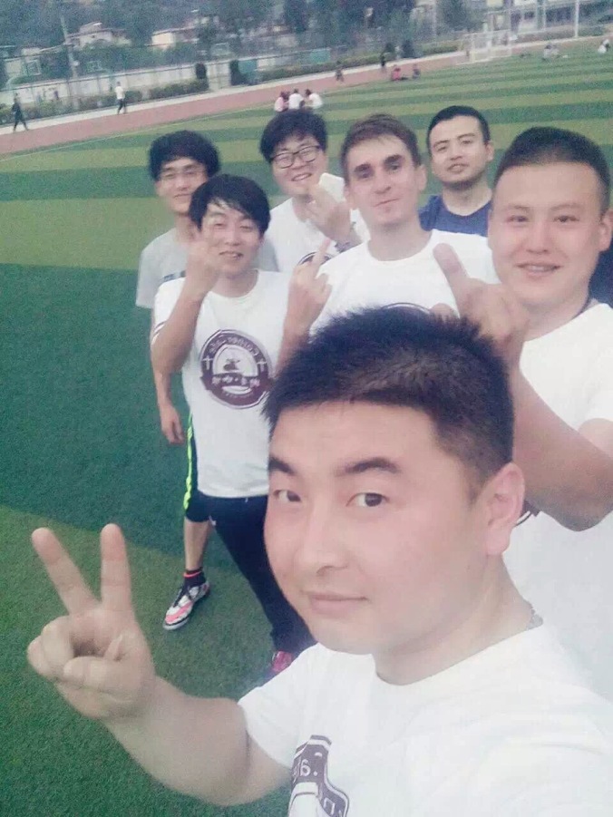 7 soccer teammates posing at practice peace corps china matt christensen